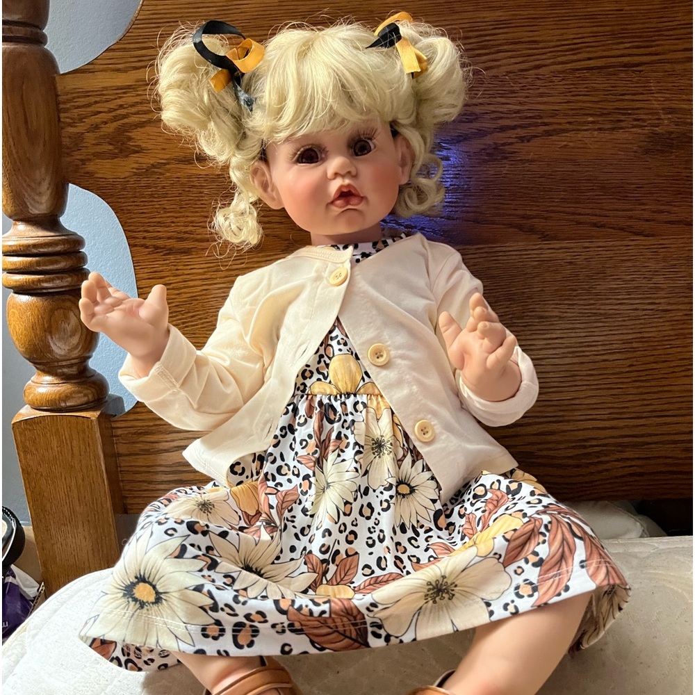24” Vinyl Fayzah Spanos doll wearing brand new baby clothes & sandals.